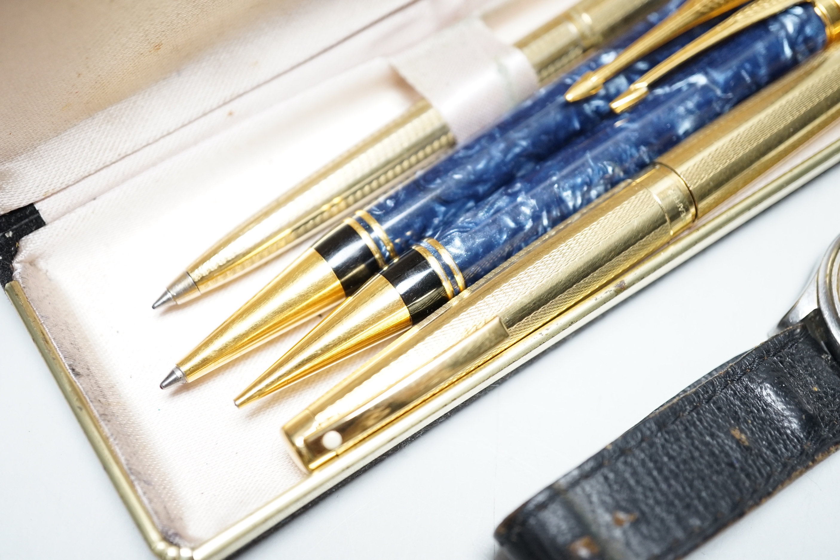 A Sheaffer fountain pen, a Parker pen and pencil pair, one other ballpoint pen and a gent's Tissot wristwatch
